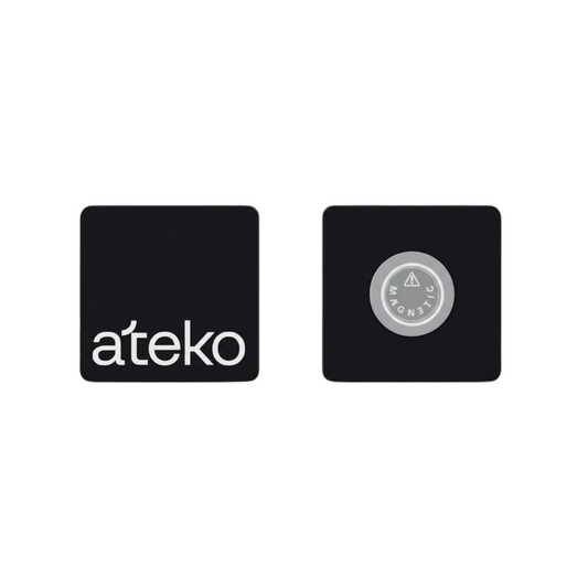 Two black square coasters with 'ateko' and 'Electronic' logos on a white background